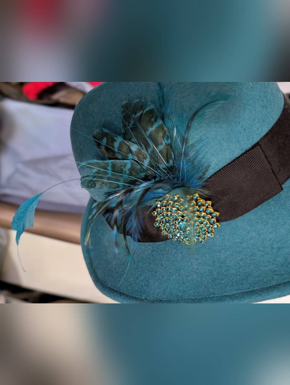 Uno Alla Volta Elegant Felt Teal Hat with Feather & rhinestone Detail